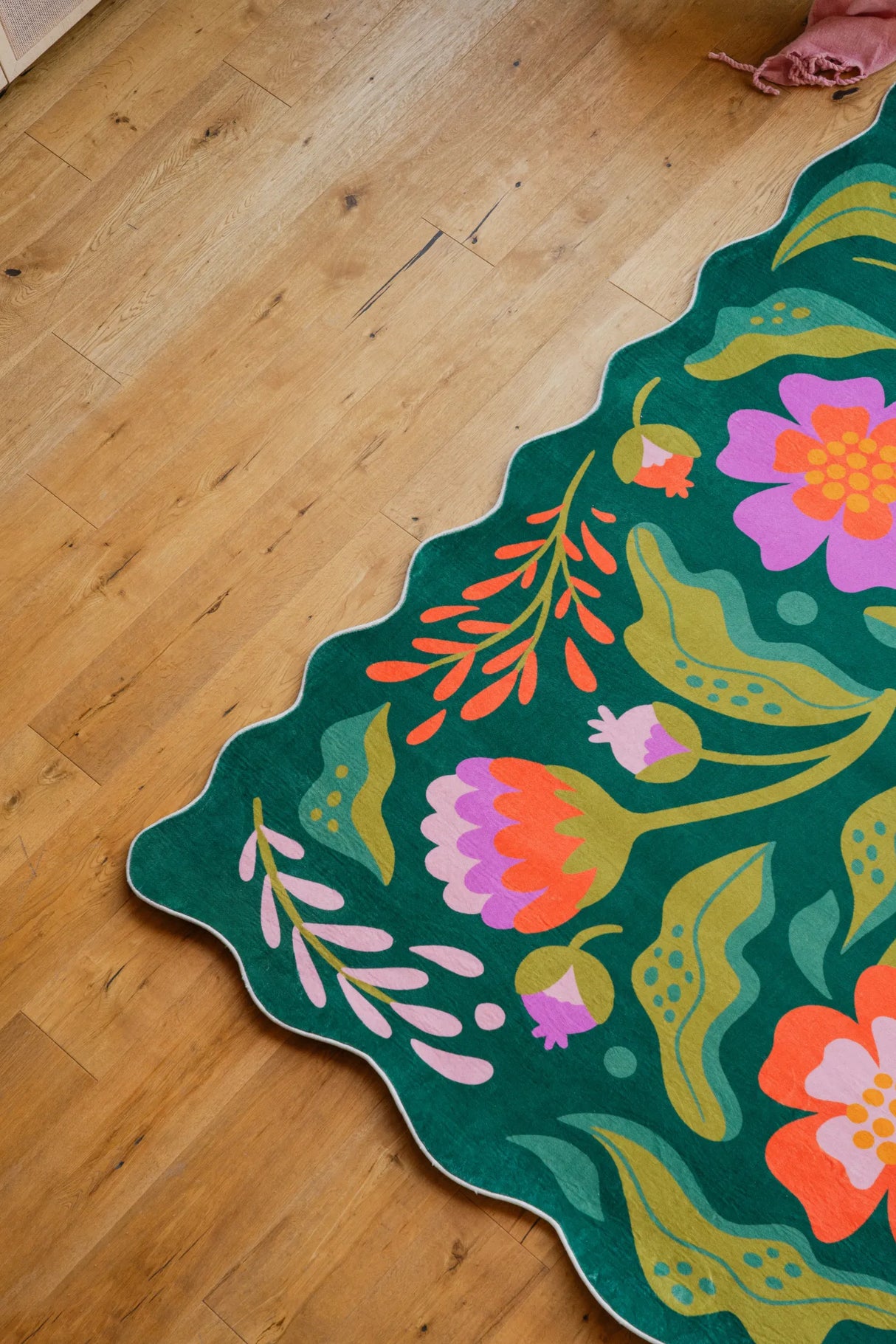 Green Base Pink Floral Wavy Rug by Jessica Miller