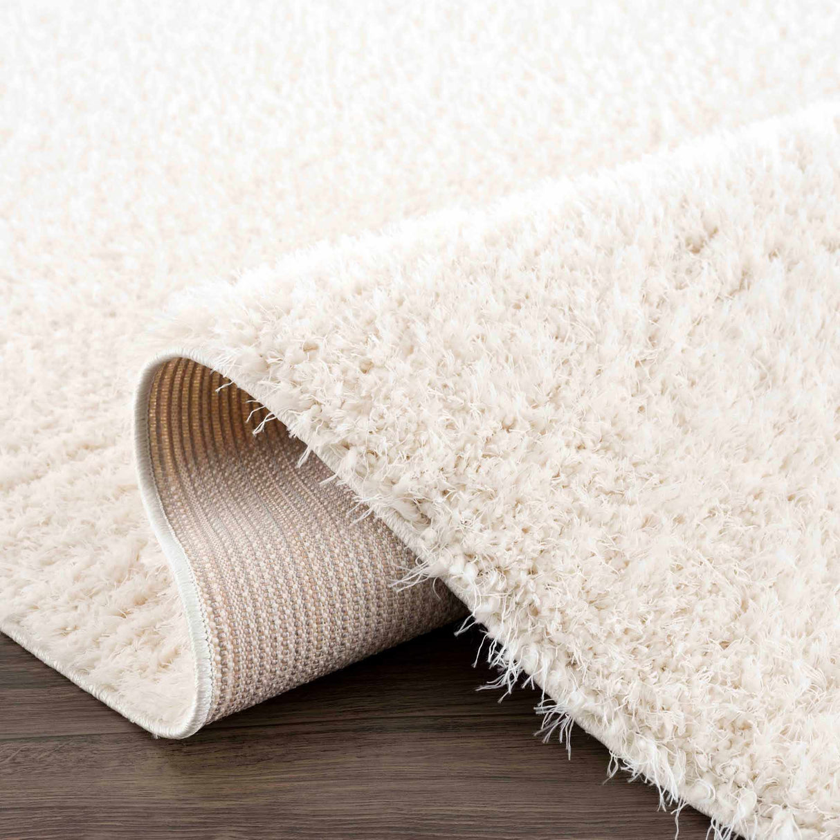 Faina Solid Cream Shag Washable Area Rug - Clearance