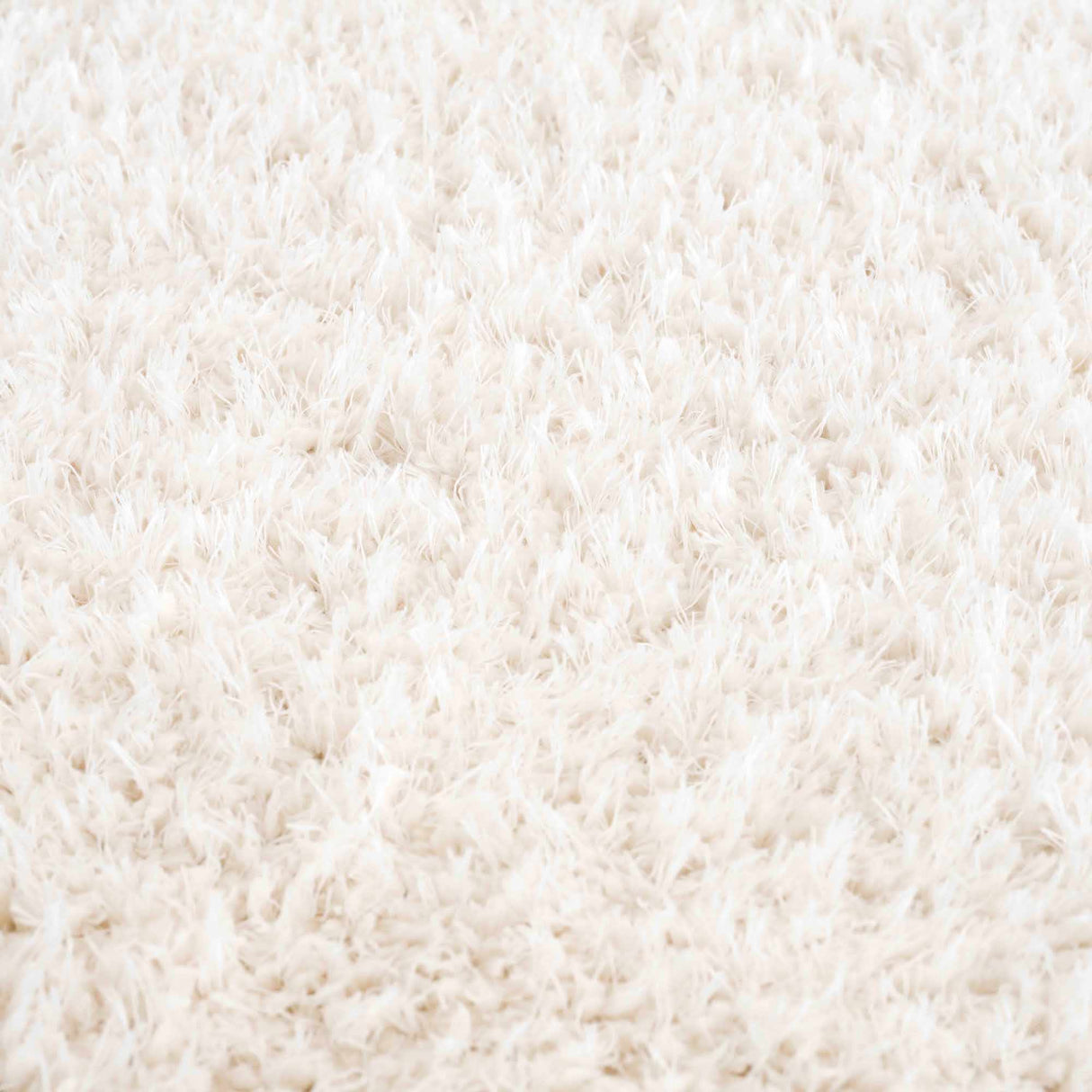 Faina Solid Cream Shag Washable Area Rug - Clearance
