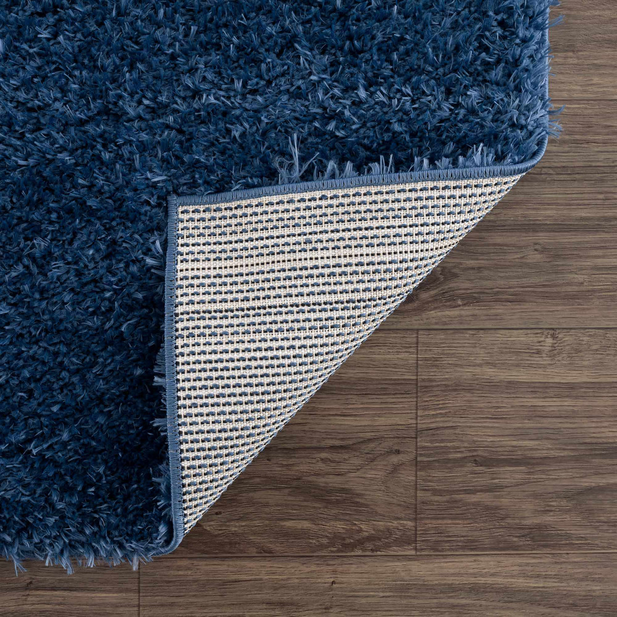 Faina Solid Dark Blue Shag Washable Area Rug - Clearance