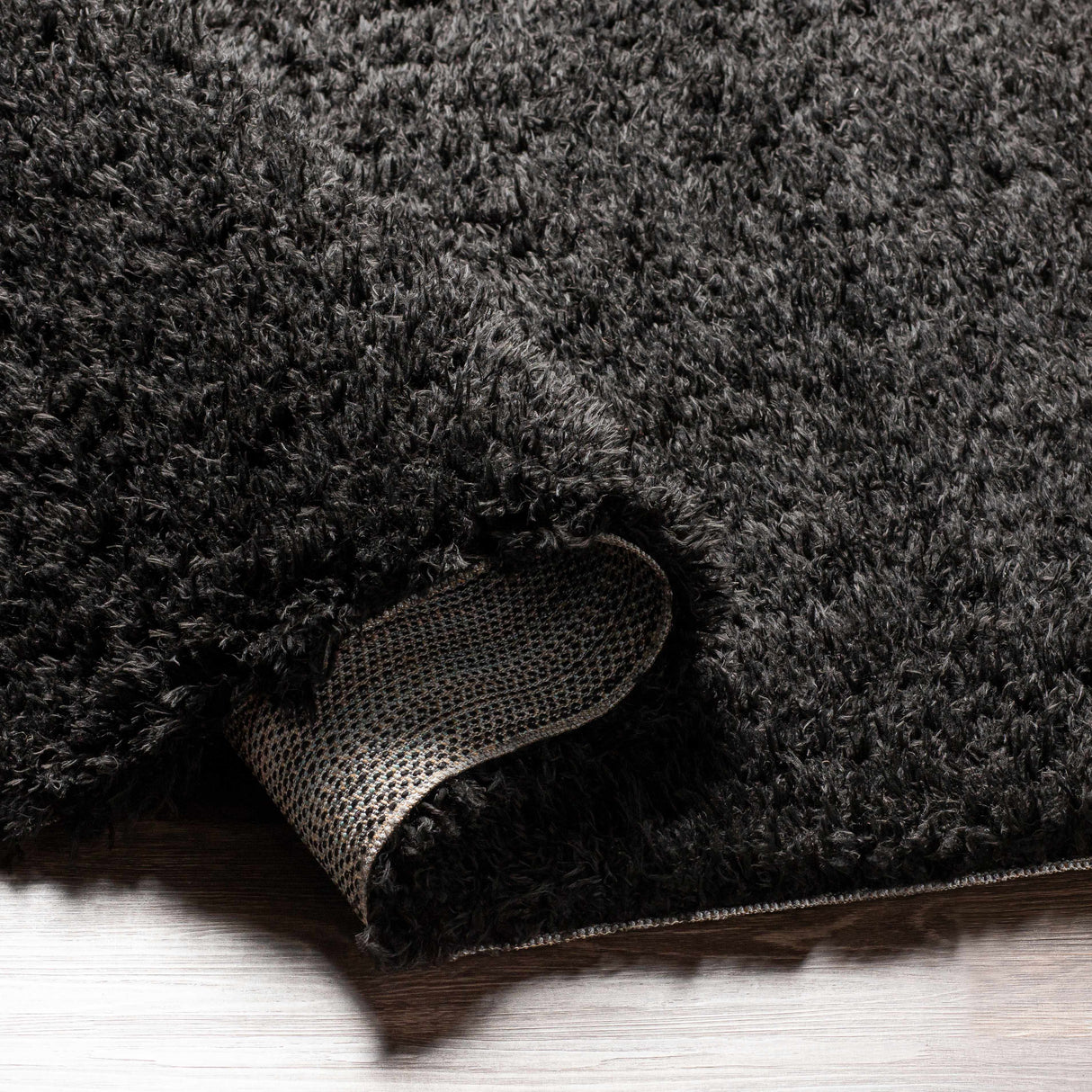 Siari Black Shag Area Rug - Clearance