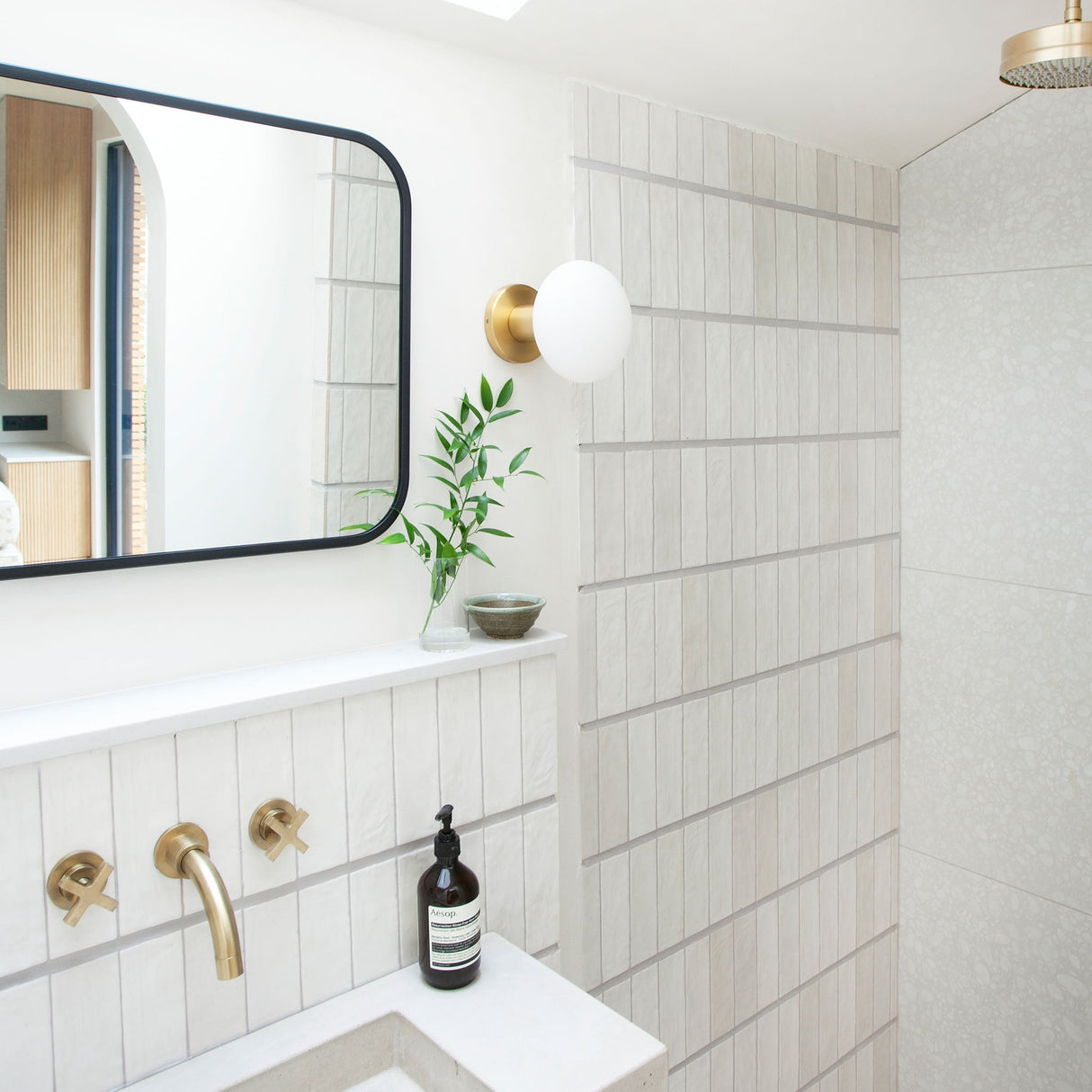 Lochan Wall Light in Brass + Oval Dim to Warm