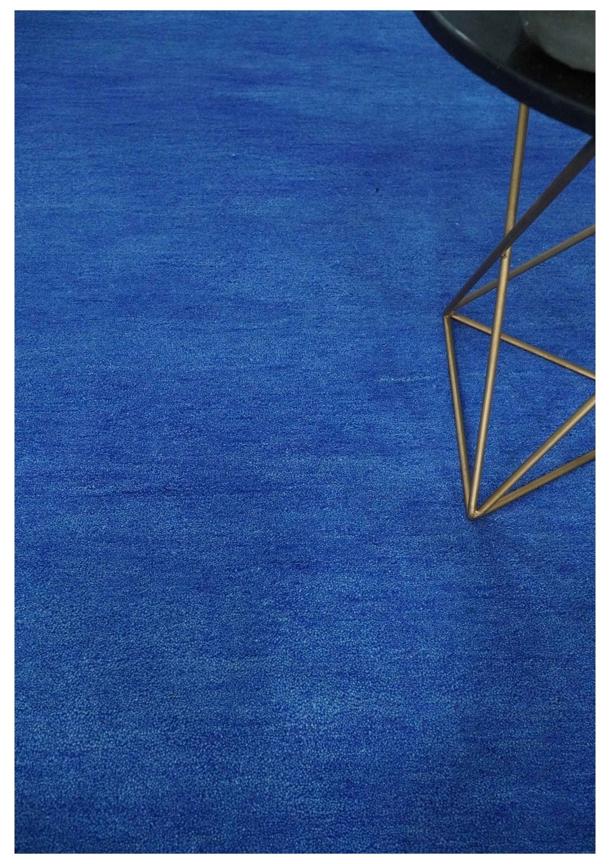 Custom made solid Blue Woolen Hand Tufted contemporary area Rug