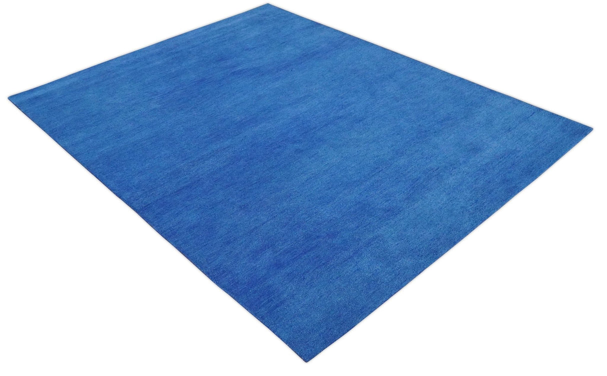 Custom made solid Blue Woolen Hand Tufted contemporary area Rug