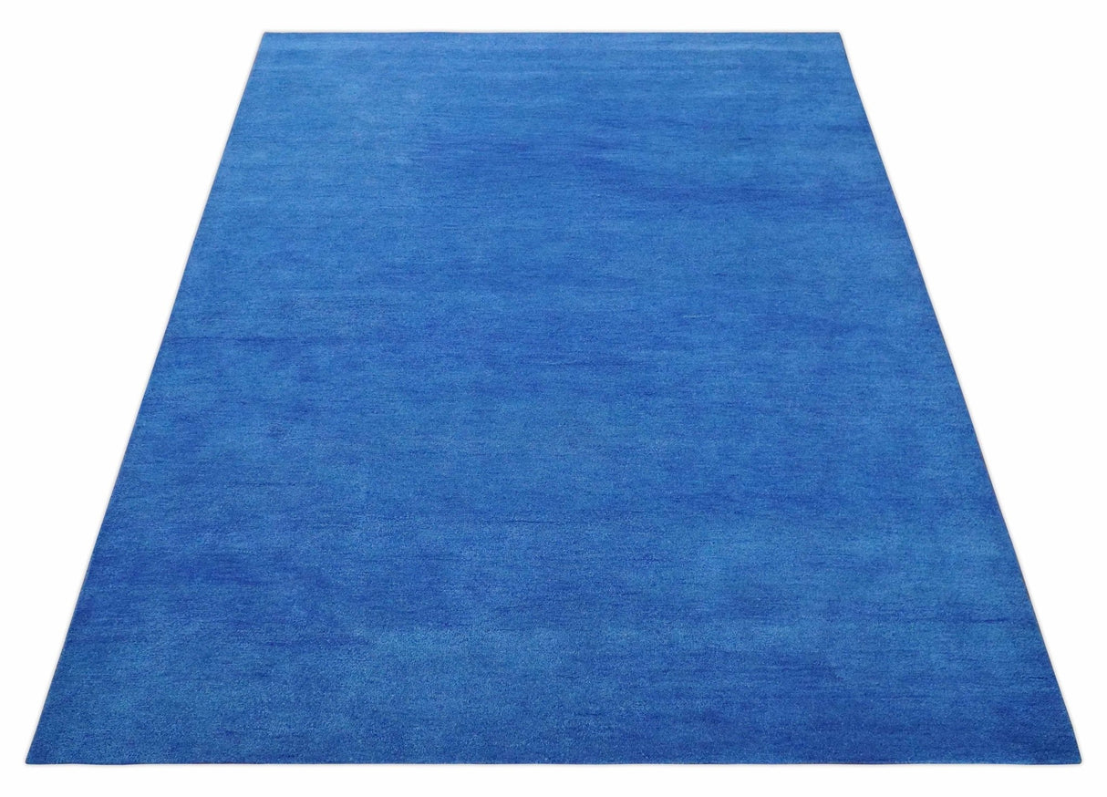 Custom made solid Blue Woolen Hand Tufted contemporary area Rug