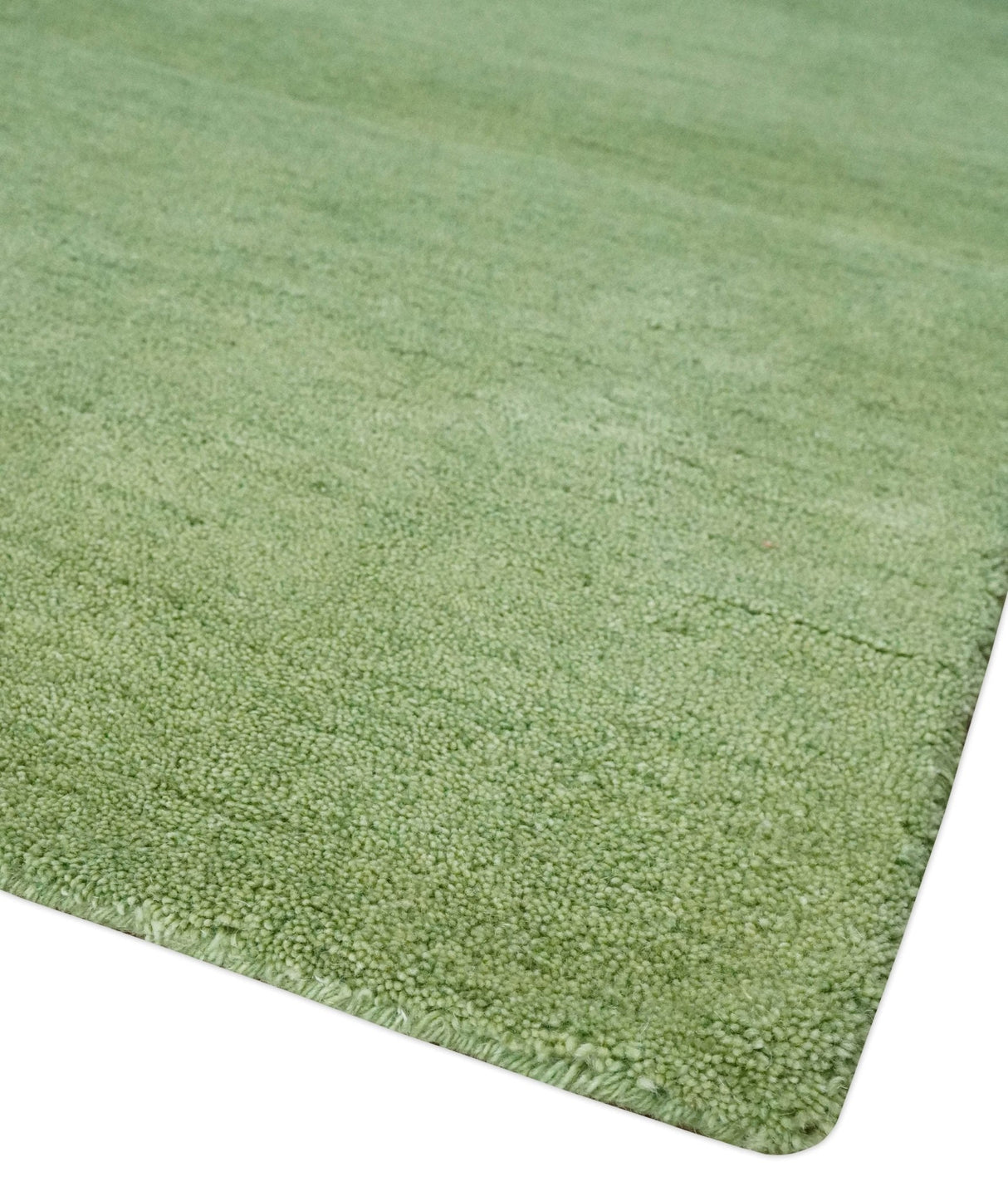 Custom Made solid Green Woolen Hand Tufted contemporary area Rug