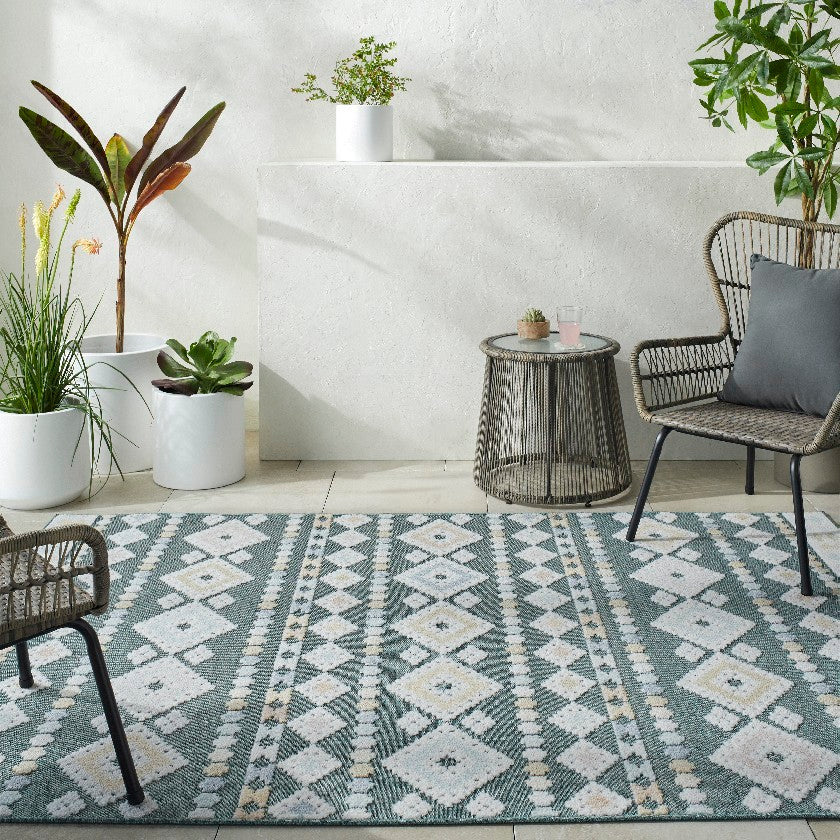 Zarinah Coastal Medium Green Area Rug