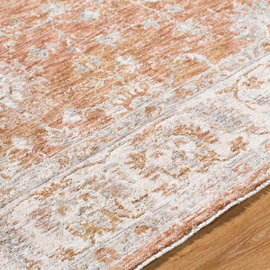 Jomarie Traditional Tan Area Rug