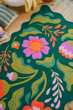 Green Base Pink Floral Wavy Rug by Jessica Miller