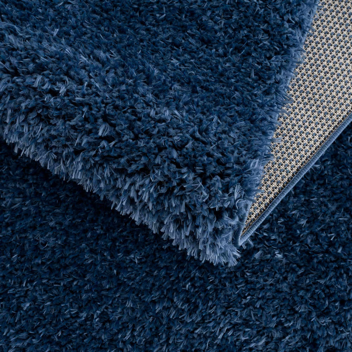 Faina Solid Dark Blue Shag Washable Area Rug - Clearance