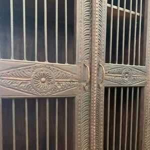 Ornately Hand Carved 45 in. Wide Armoire With Iron Grill Doors