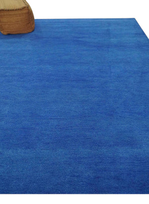 Custom made solid Blue Woolen Hand Tufted contemporary area Rug