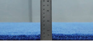 Custom made solid Blue Woolen Hand Tufted contemporary area Rug