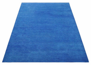 Custom made solid Blue Woolen Hand Tufted contemporary area Rug