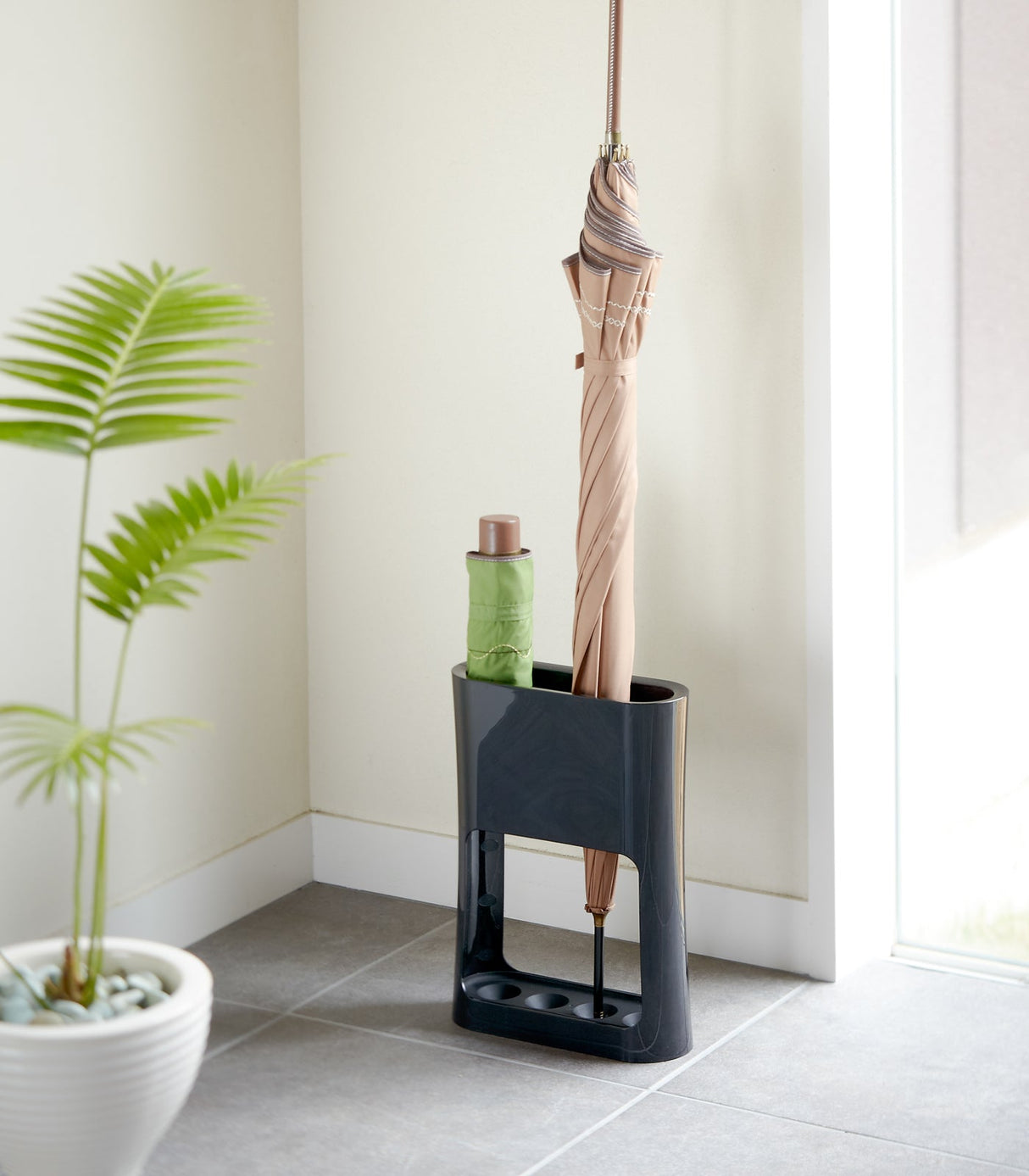 Porte-parapluie compact