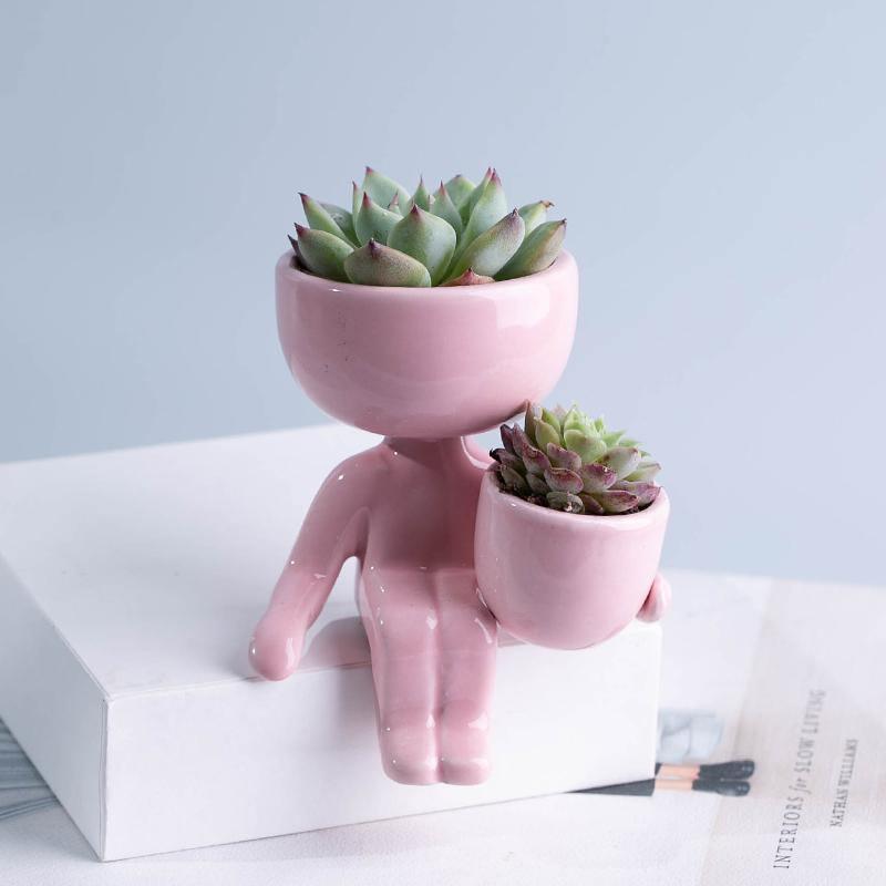 Little Human Ceramic Succulent Planter Sitting Next to Pot / Pink | Sage & Sill