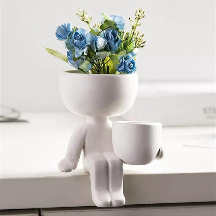 Little Human Ceramic Succulent Planter Sitting Next to Pot / White | Sage & Sill
